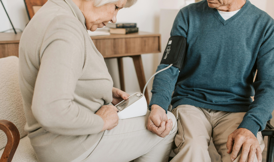 woman taking blood pressure